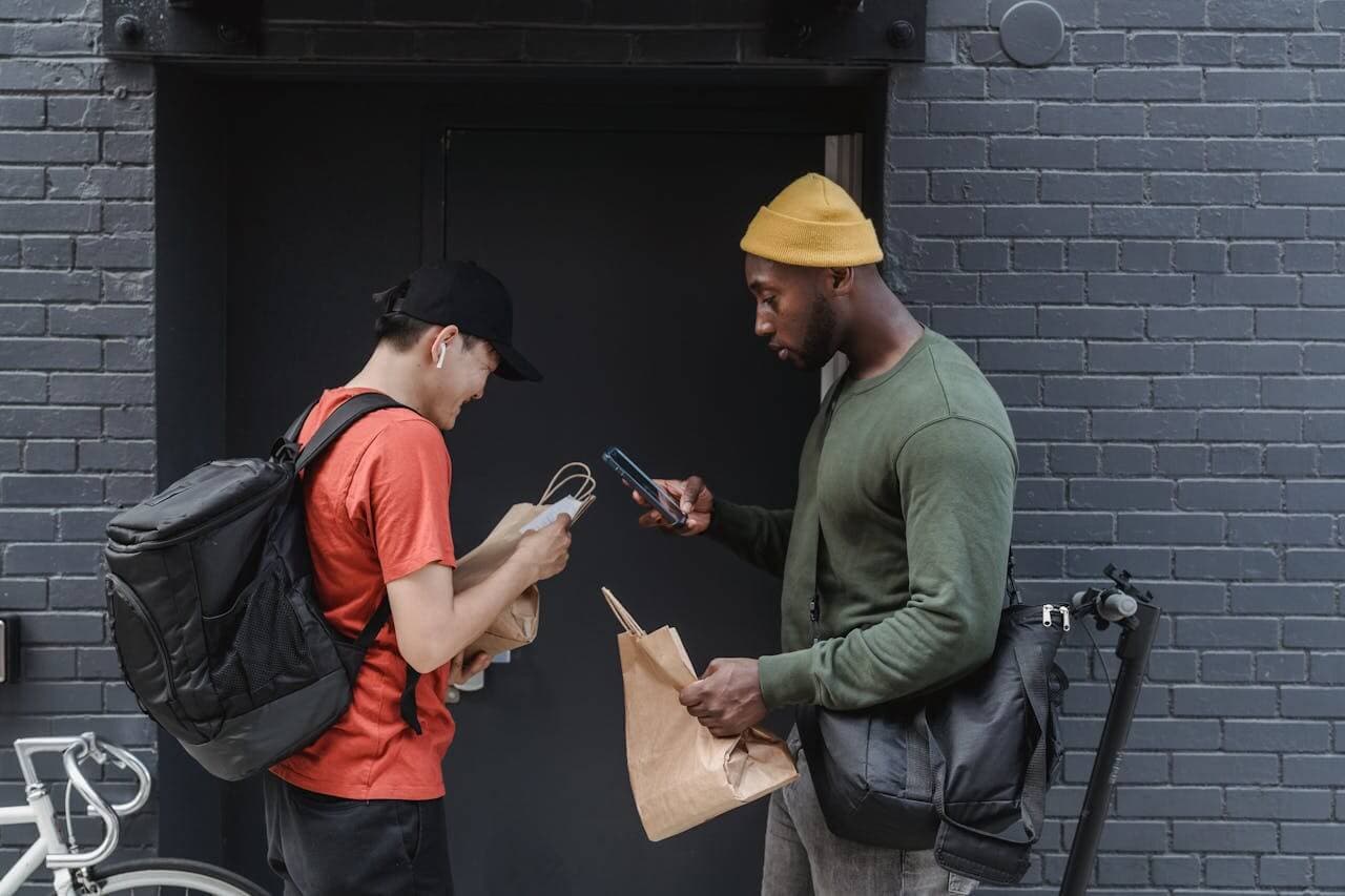 Courier completing a doorstep delivery