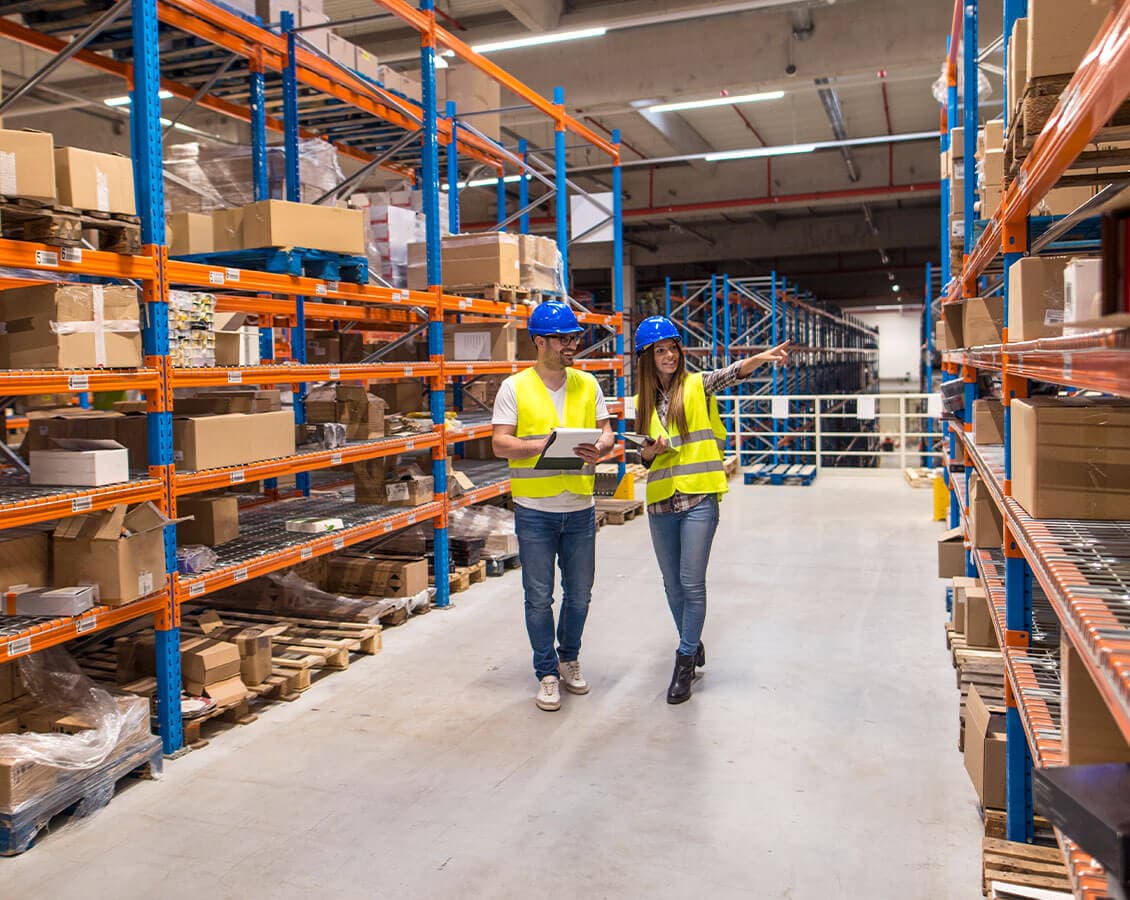 Warehouse staff managing inventory